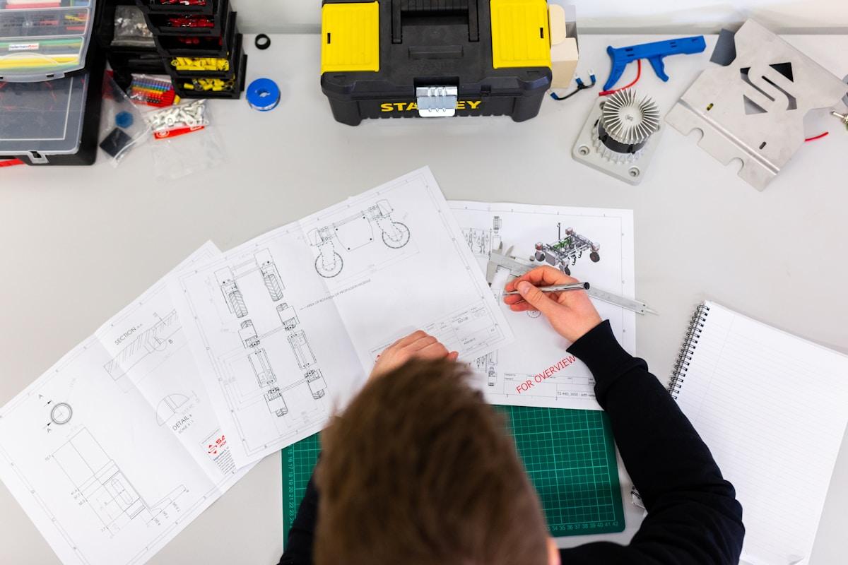 Engineer reviewing plans on a construction site